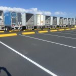 striped truck yard at Amazon warehouse